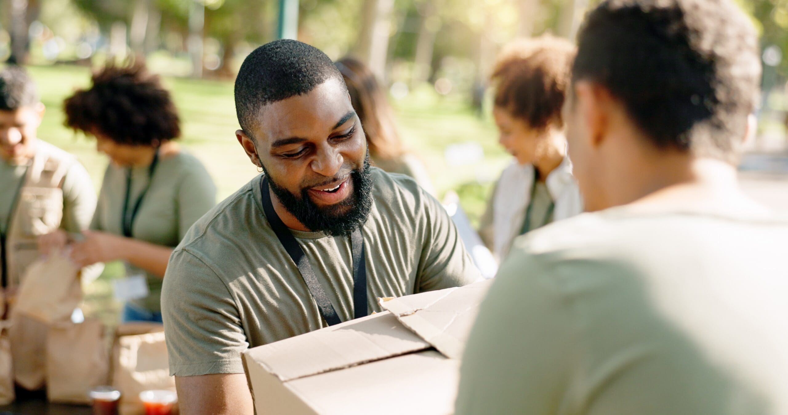 Charity,,Cardboard,Boxes,And,Volunteer,In,Park,For,Donation,,Distribution
